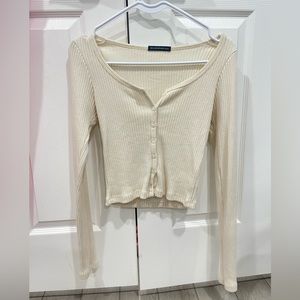 Brandy Melville button up cream top, size small.